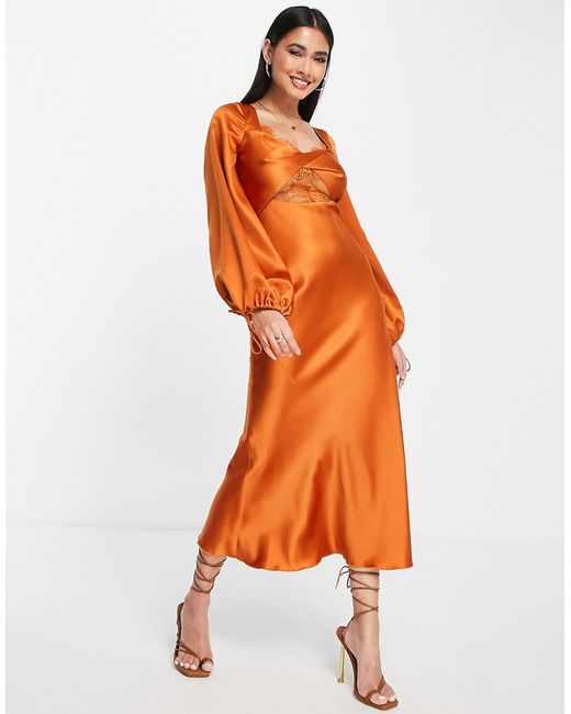 Asos Design bias satin long sleeve midi dress with delicate lace detail and twist front in rust-