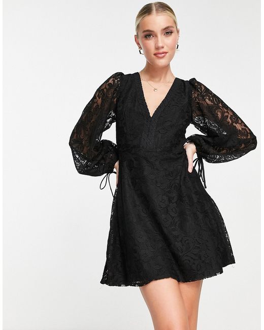 Love Triangle long sleeve mini dress with open back in lace