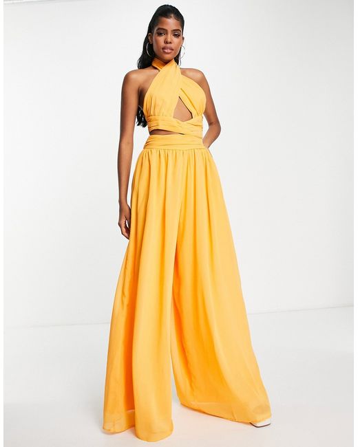 Asos Design halter ruched jumpsuit with cut out in marigold-
