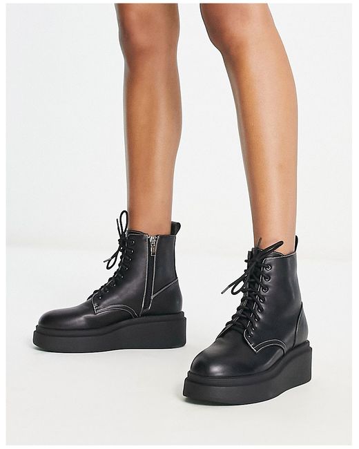 London Rebel flatfrom chunky lace up boots in