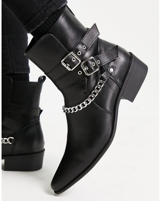 Truffle Collection heeled western hardware strap boots in faux leather