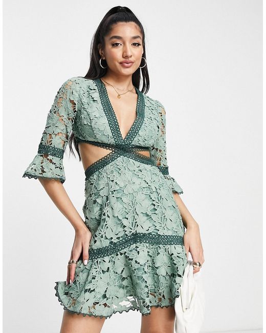 Asos Design lace mini dress with circle trim and cut out detail in sage