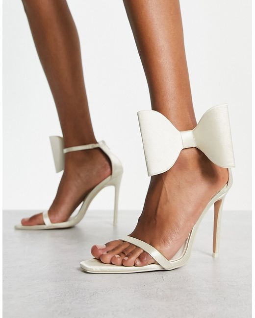 Public Desire Zeal bow detail satin sandals in off