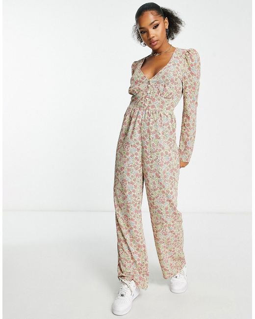 Monki jumpsuit with long sleeves in all over print floral-