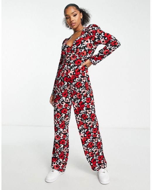 Monki jumpsuit with long sleeves in all over print