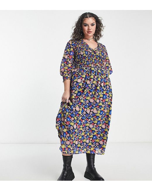 ASOS Curve DESIGN Curve midi smock dress with shirred cuffs in black based floral print