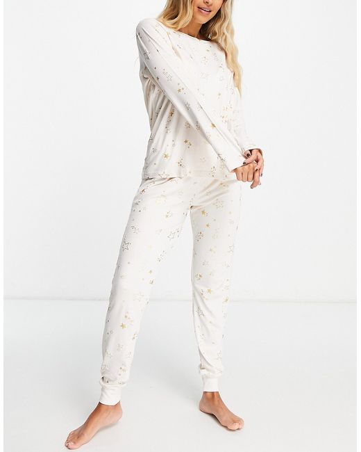 Chelsea Peers long sleeve and cuffed pants pajama set in cream gold star print-