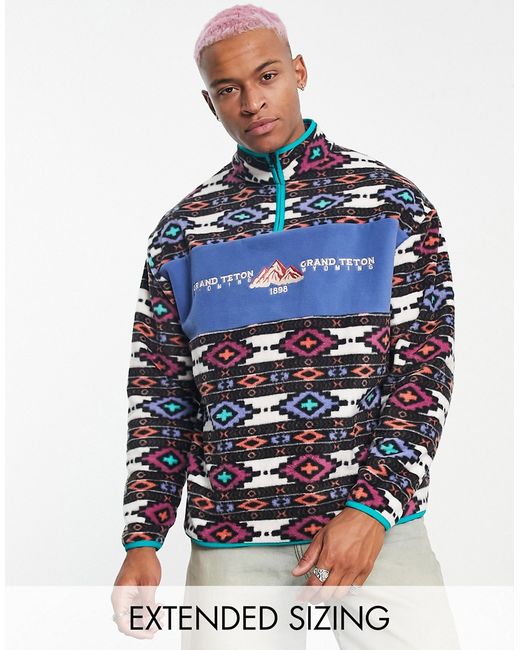 Asos Design oversized half zip polar fleece sweatshirt in all-over abstract print-