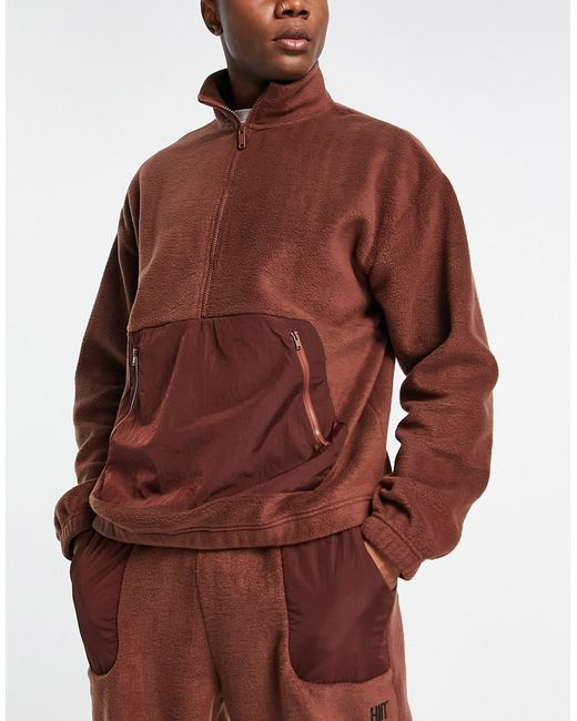 Hiit 1/4 zip in fleece with woven panels-