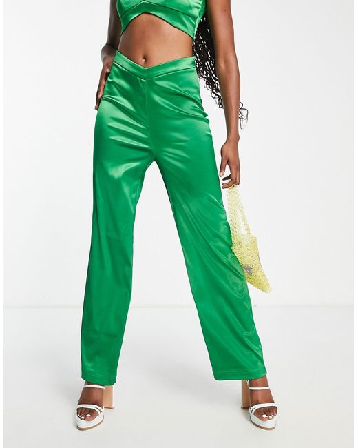 The Frolic notch detail satin pants in jade part of a set