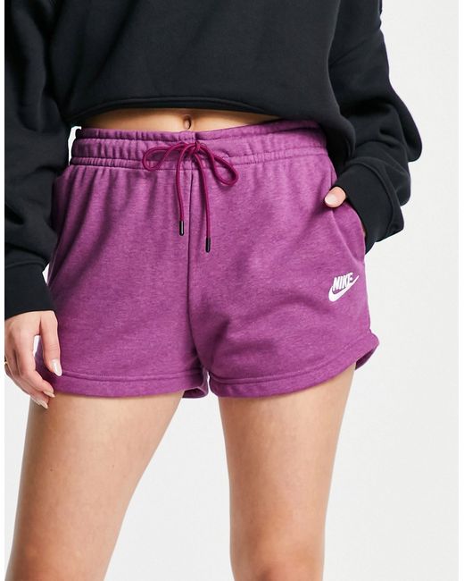 Nike Essential Fleece shorts in purple-