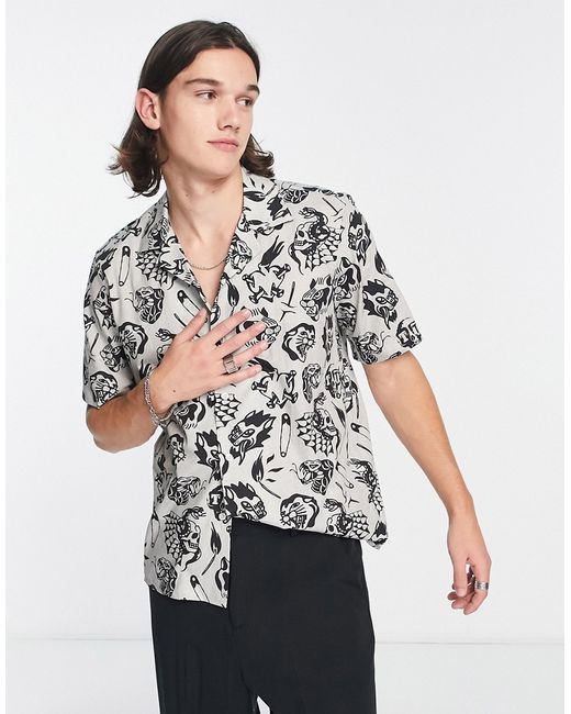 Twisted Tailor decker revere collar short sleeve shirt in with black tattoo print