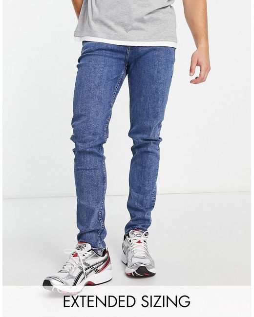 Asos Design skinny jeans in mid wash