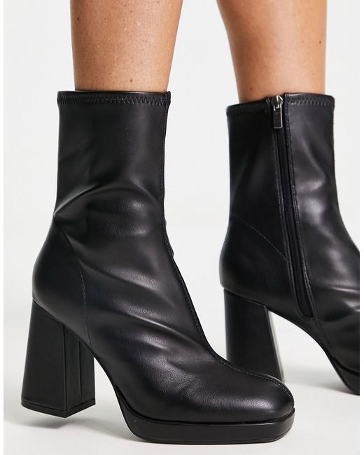 Bershka faux leather heeled ankle sock boots in
