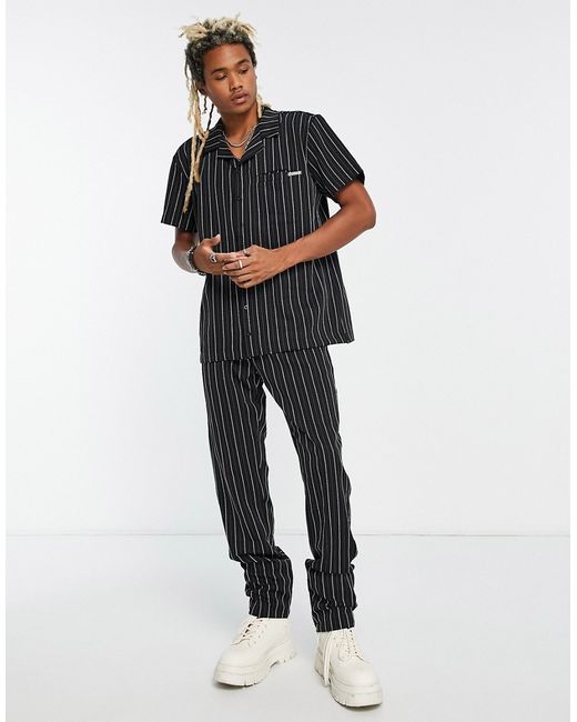 Liquor N Poker straight leg pants in with white pinstripe part of a set