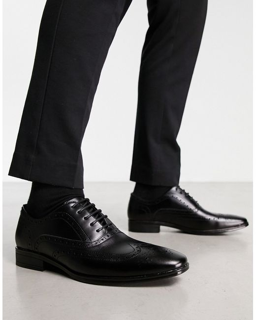 Office macro brogues in leather