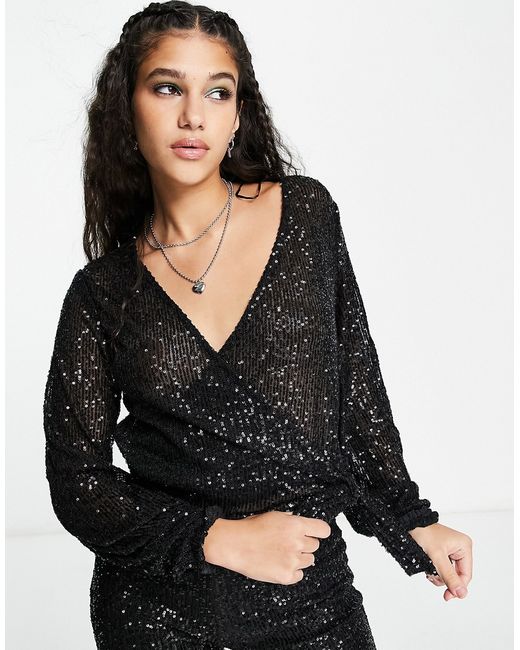Pieces sequin balloon sleeve wrap top in part of a set