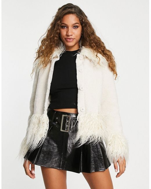 Reclaimed Vintage cropped fur jacket in cream-