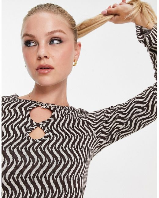 New Look knit cut out swirl long sleeve top in