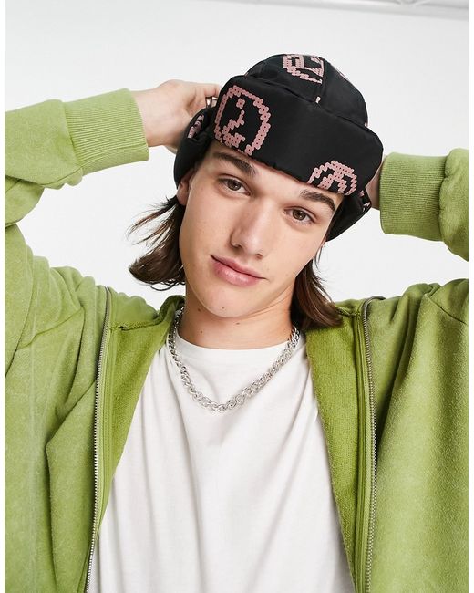 Asos Design reversible trapper hat with pink print in black-