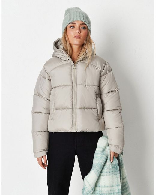 Missguided stepped hem puffer jacket in sage-