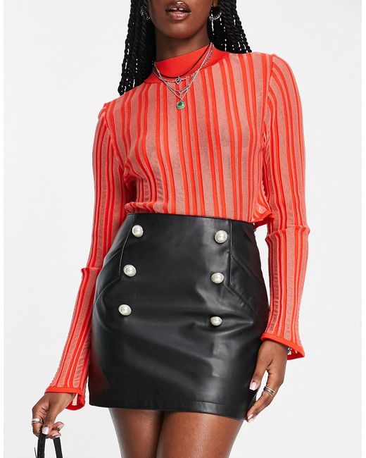 Asos Design faux leather mini skirt with pearl button detail in