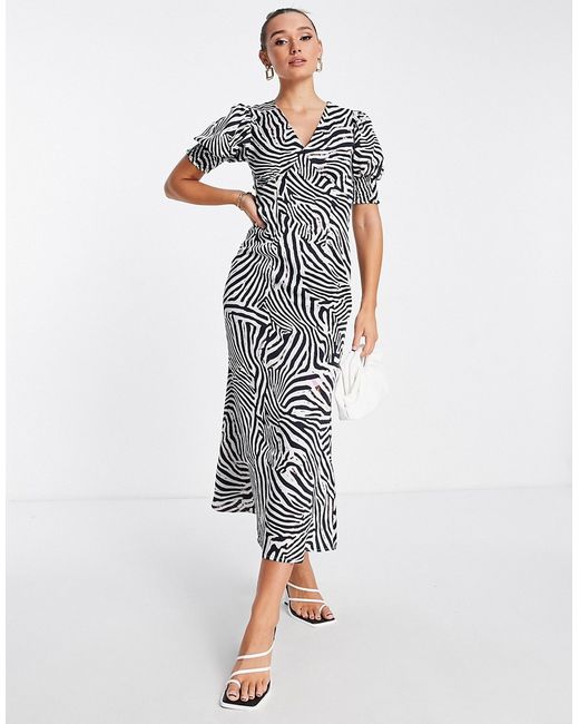 Never Fully Dressed puff sleeve maxi dress in zebra print-