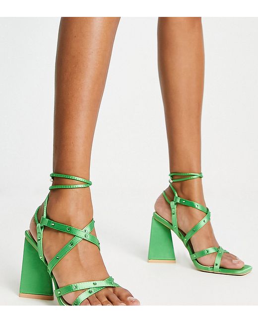 Raid Wide Fit Elinora block heel sandals with stud embellishment in green satin-
