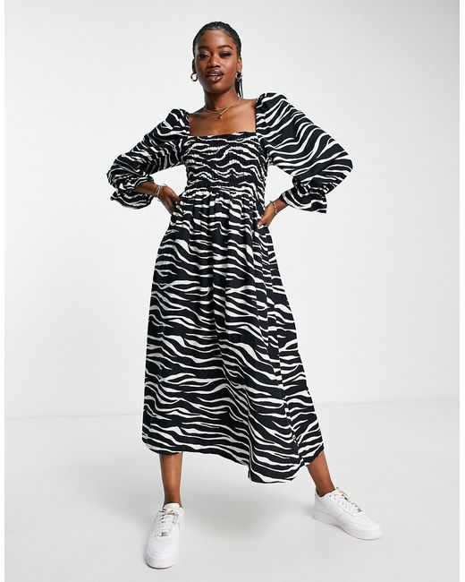 New Look puff sleeve zebra print midi dress in