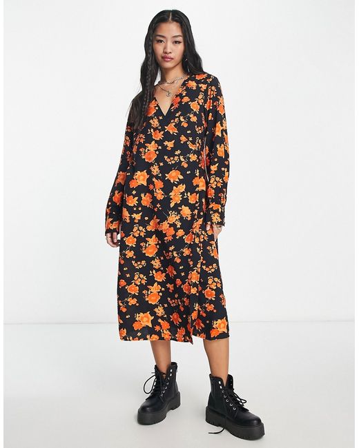 Vero Moda long sleeve wrap midi dress in orange floral-