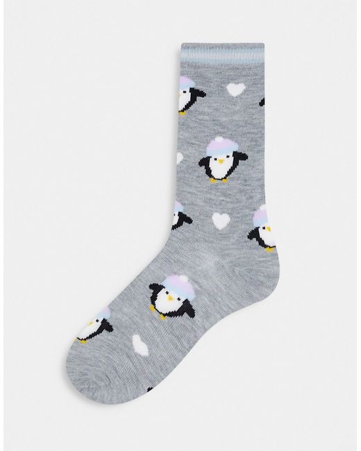 Loungeable christmas penguin socks with matching gift bag in