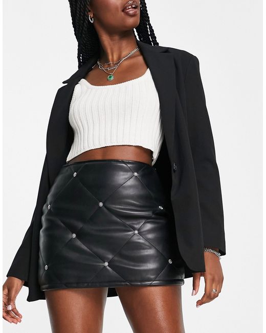 Asos Design faux leather mini skirt with studs in