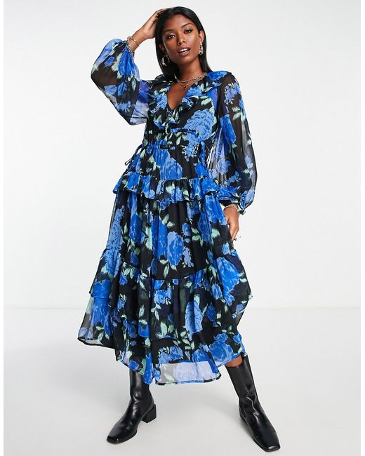 Asos Design tiered maxi dress with frills in black based blue floral print-