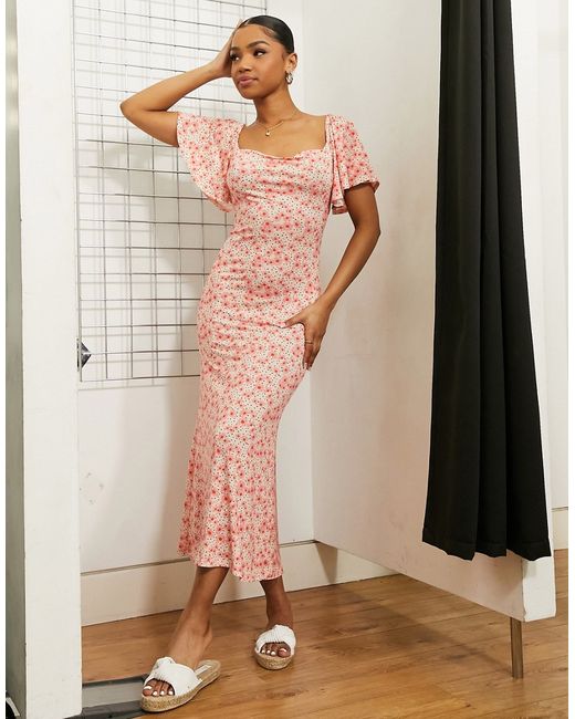 Asos Design flutter sleeve midi tea dress in floral and spot print-