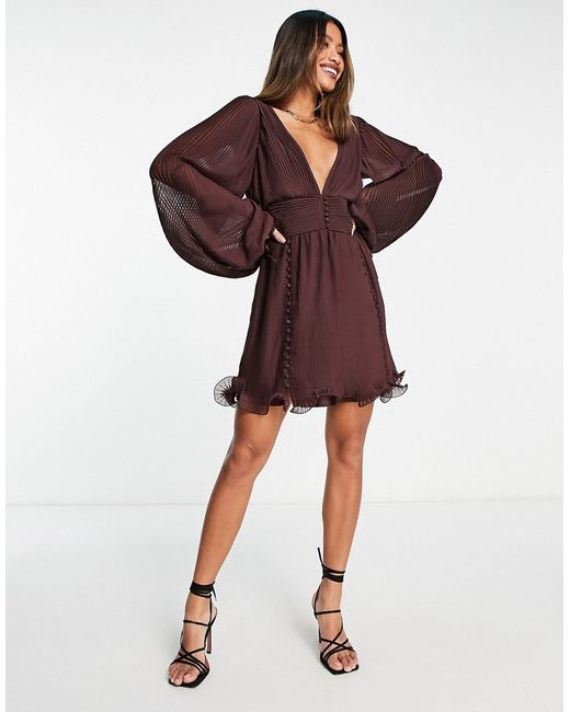 Asos Design pleat mini dress with button detail and frill hem in burgundy-