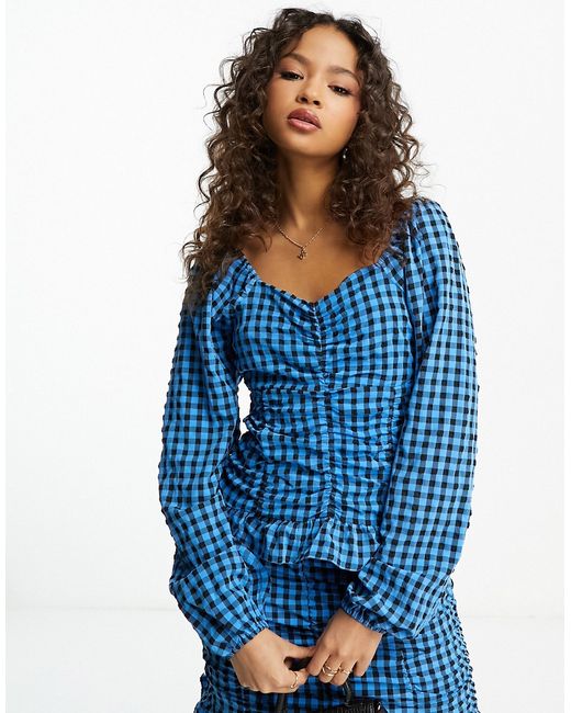 Pieces frill detail top in blue and black plaid-