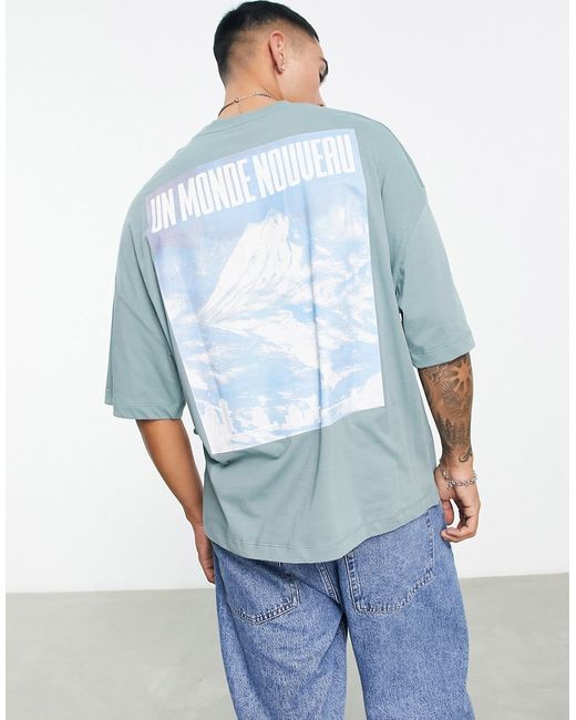 Asos Design oversized T-shirt in with photographic mountains back print