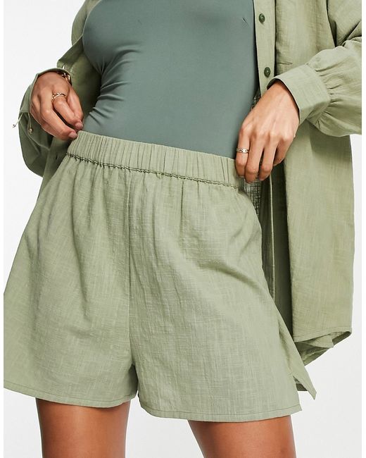 Asos Design textured beach shorts in khaki part of a set-