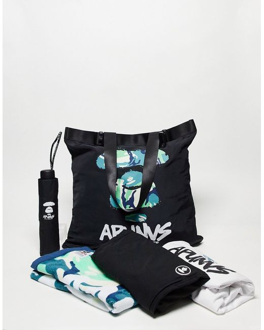 Aape By *A Bathing Ape® by A Bathing Ape happy bag in black and white containing various products-