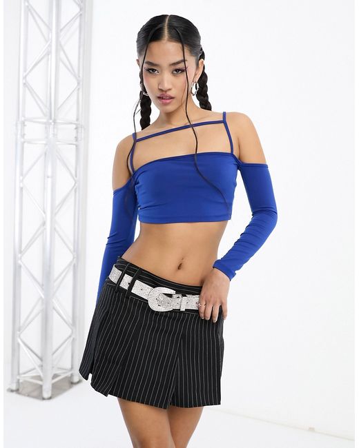 Rebellious Fashion crop top with strap details in cobalt-
