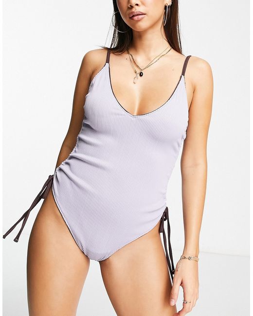 We Are We Wear nicola plunge reversible swimsuit in dark and lavender