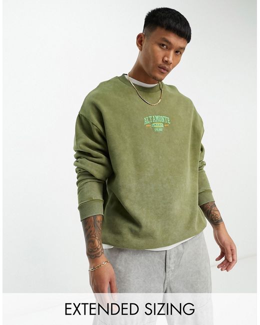 Asos Design oversized sweatshirt in acid washed with central embroidery