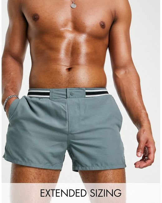Asos Design swim shorts in short length with smart styling and contrast rib