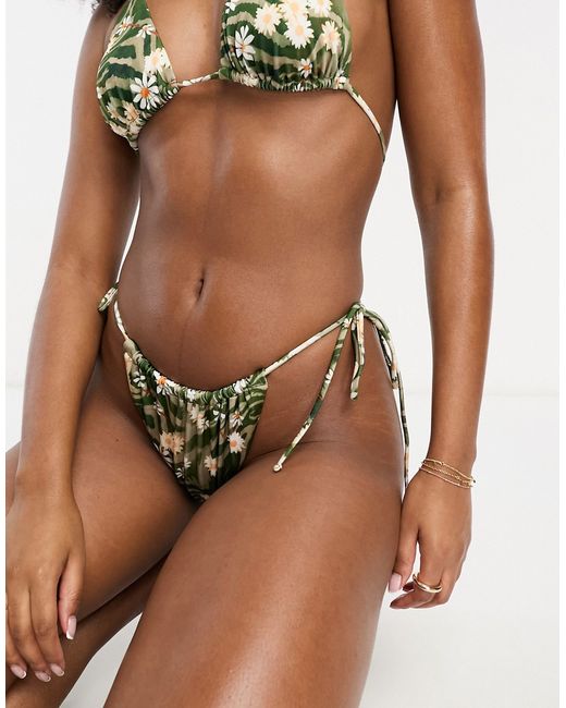 Asos Design mix and match tie side bikini bottom in animal daisy print-