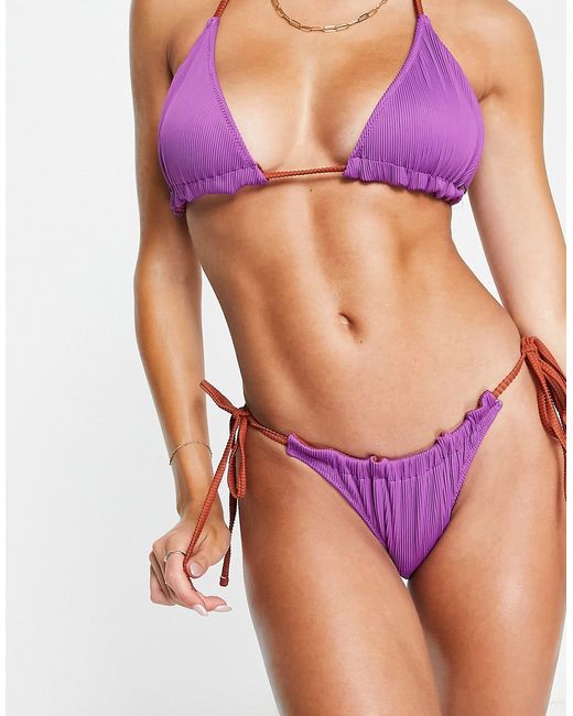 We Are We Wear Melissa reversible ribbed tie side bikini bottom in ultraviolet vs cinnamon-