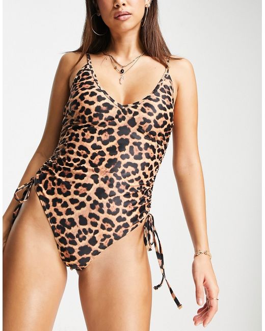 We Are We Wear Nicola plunge swimsuit in animal print-
