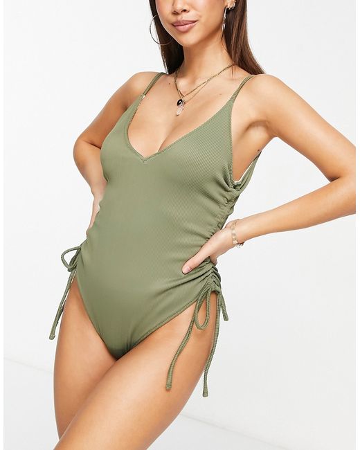 We Are We Wear Nicola ribbed swimsuit in olive vs cream-