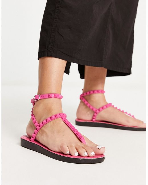 London Rebel studded t-bar ankle strap jelly sandals in pink-