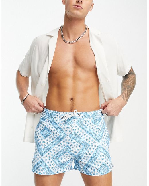 Another Influence swim shorts in and white geometric print