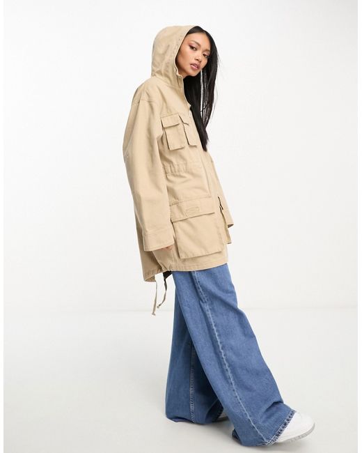 Asos Design oversized washed parka with cargo pockets in sand-